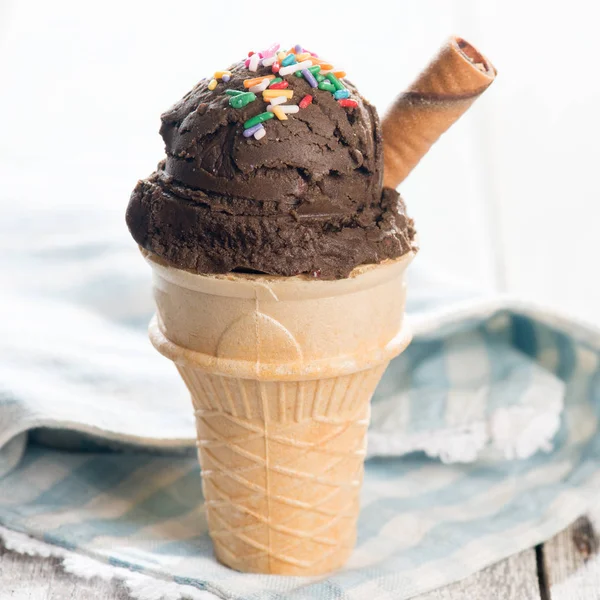 Brown ice cream in waffle cone — Stock Photo, Image