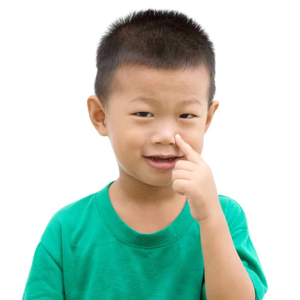 Азиатский ребенок, указывающий на нос — стоковое фото