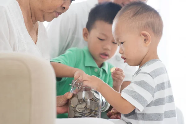 Family saving coins concept — Stock Photo, Image