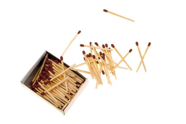 Matches with box, spilling on white — Stock Photo, Image