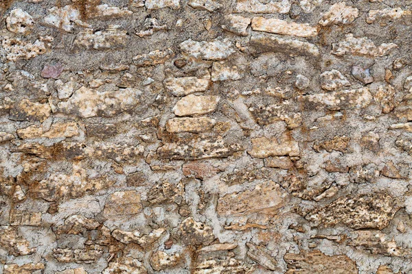 Pozadí, písek kámen texturou nástěnné detail — Stock fotografie