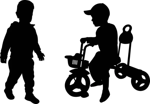 Siluetas de dos niños pequeños — Vector de stock