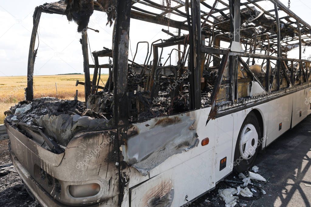 Burned Coach Bus Vehicle at Highway Accident