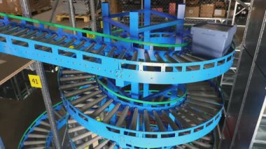 Dağıtım Deposunda Plastik Kutulu Spiral Gravity Taşıyıcı