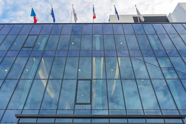 Flags Top Blue Glass Building — Stock Photo, Image