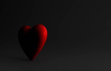 Large Dimly Lit Red Heart On Black Backgroun