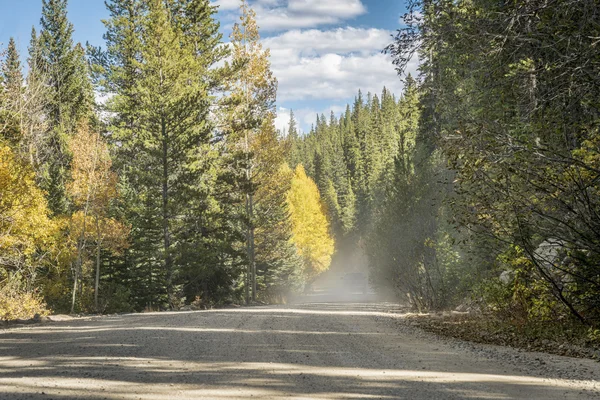 Dusty road in Colorado high country — Stock Photo, Image