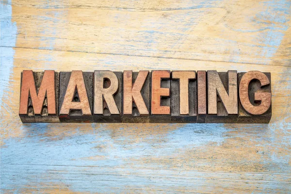 Marketing word in wood type — Stock Photo, Image