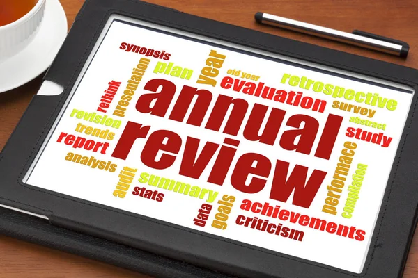 Annual review word cloud on tablet — Stock Photo, Image