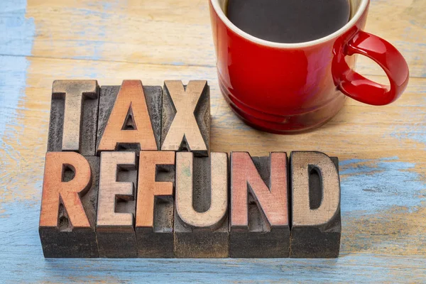 Tax refund in wood type — Stock Photo, Image