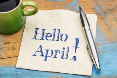 Hello April on napkin with coffee clipart