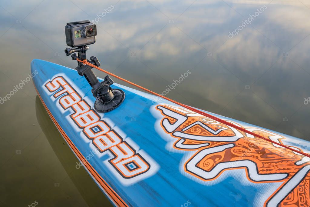FORT COLLINS, CO - FEBRUARY 18, 2017: GoPro Hero 5 camera mounted with a suction cup on a bow of Starboard stand up paddlebord.