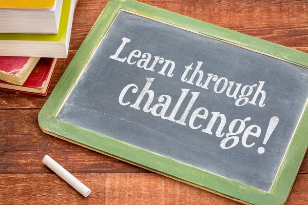 Learn through challenge - blackboard concept — Stock Photo, Image