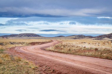 Dirt ranch road at Colorado foothills clipart