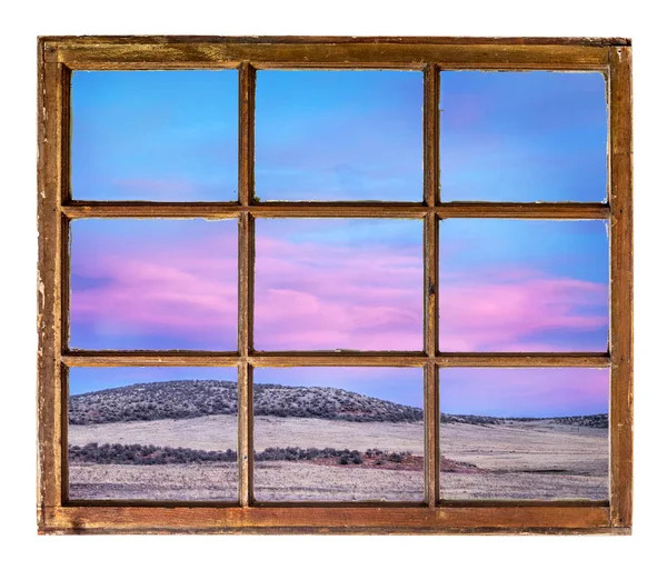 Colorado céu do por do sol como visto através da janela velha — Fotografia de Stock