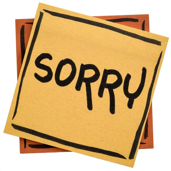 Sorry - apology on sticky note — Stockfoto