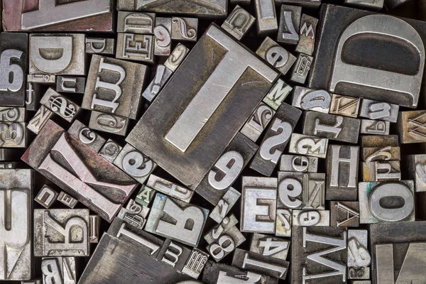 Old letterpress metal type printing blocks — Stock Photo, Image