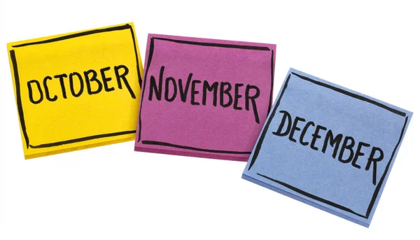 Ottobre, novembre e dicembre su note adesive — Foto Stock