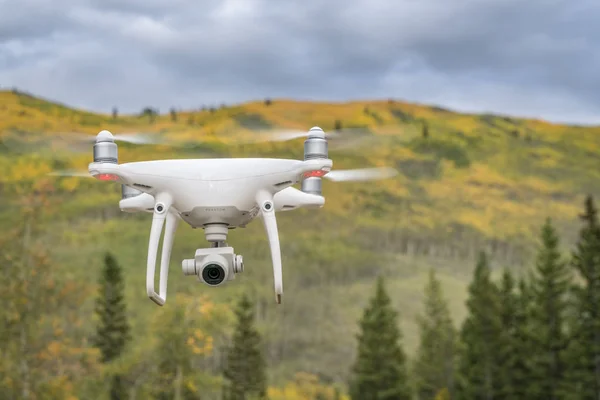 Phantom drone flying in mountains — Stock Photo, Image