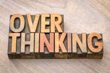 overthinking word abstract in wood type clipart