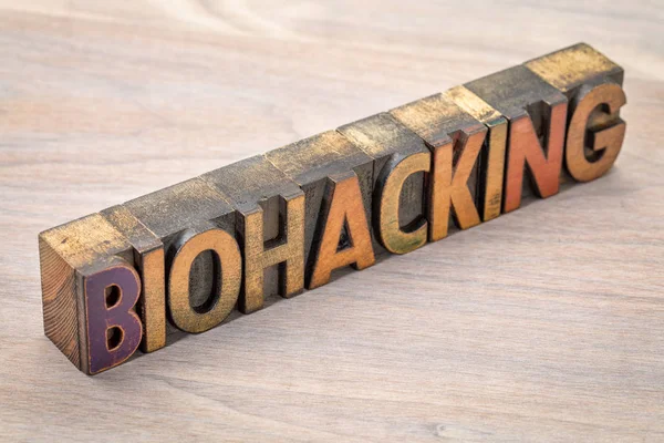 Biohacking word abstract in wood type — Stock Photo, Image