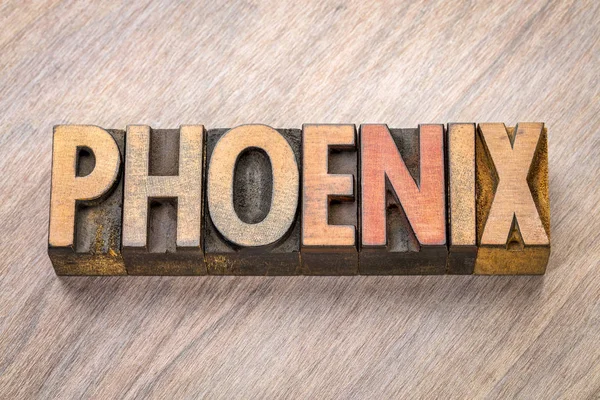 Phoenix woord abstract in boekdruk houtsoort — Stockfoto