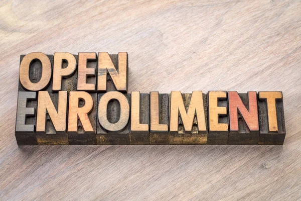 Open enrollment word abstract in wood type — Stock Photo, Image
