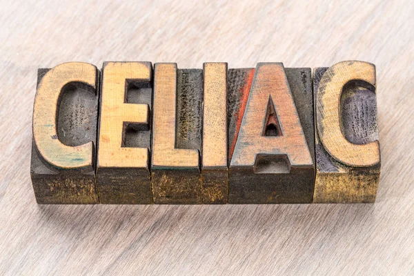 Celiac ordet abstrakt i trä typ — Stockfoto