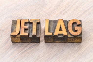 jet lag word abstract in wood type clipart