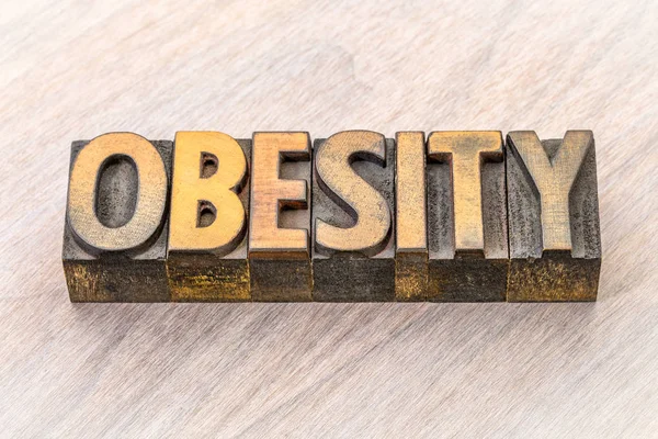 Palabra obesidad abstracto en tipo de madera —  Fotos de Stock