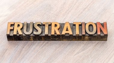 frustration word abstract in wood type clipart