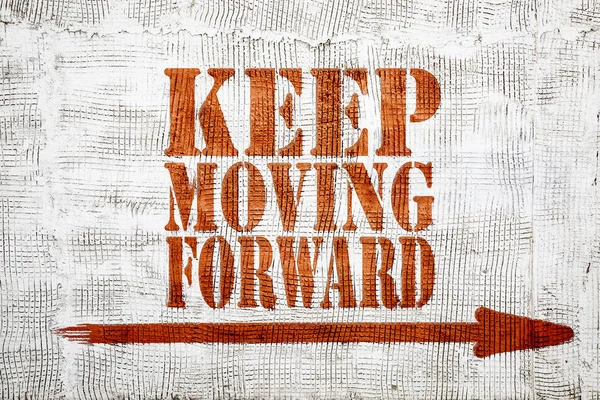 Keep moving forward -  graffiti on stucco wall