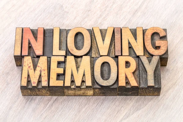 In loving memory word abstract in wood type — Stock Photo, Image