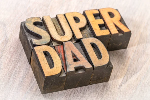 super dad word abstract in wood type