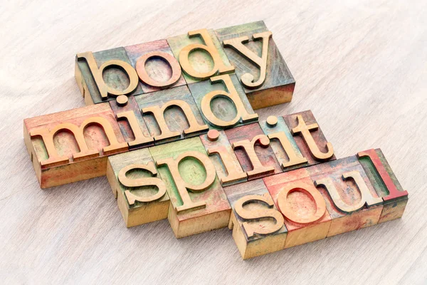 Body, mind, spirit and soul word abstract in wood type — Stock Photo, Image