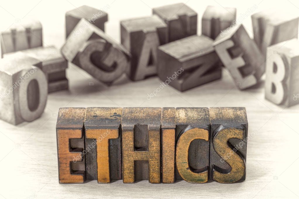 ethics word  abstract  in letterpress wood type 