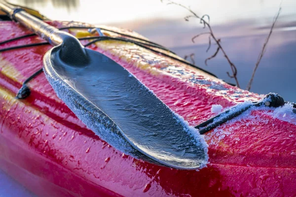 Paddle and kayak deck covered by ice — Stock Photo, Image