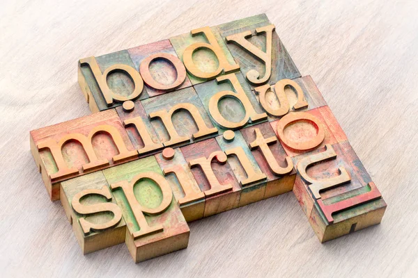 Body, mind, spirit and soul word abstract in wood type — Stock Photo, Image