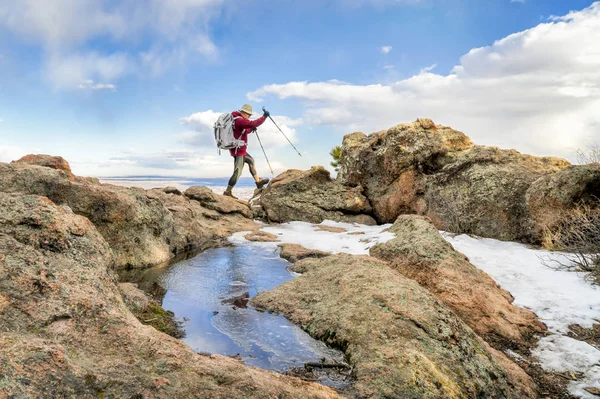 Mature backpacker on a mountain ridge — Stock Photo, Image