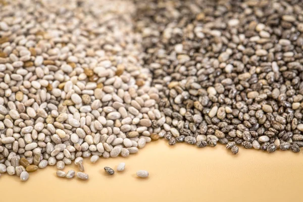 White and black chia seeds — Stock Photo, Image
