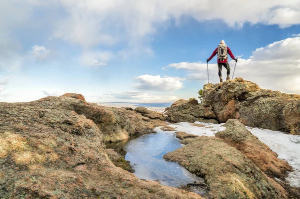 Mature backpacker on a mountain ridge — Stock Photo, Image