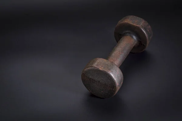 Exercise concept - iron dumbbell — Stock Photo, Image