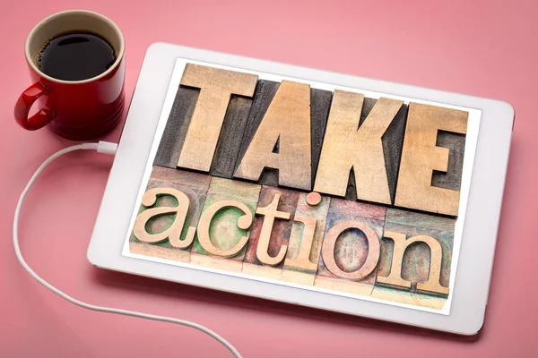 Prendre action concept de motivation sur tablette — Photo