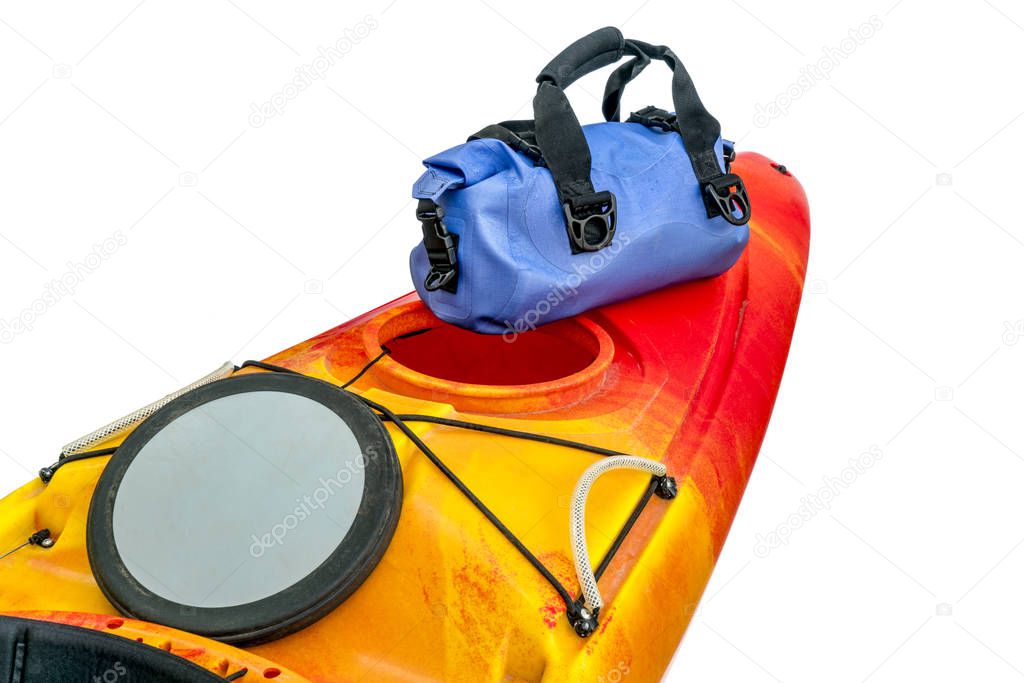 kayak deck with open hatch and dry bag