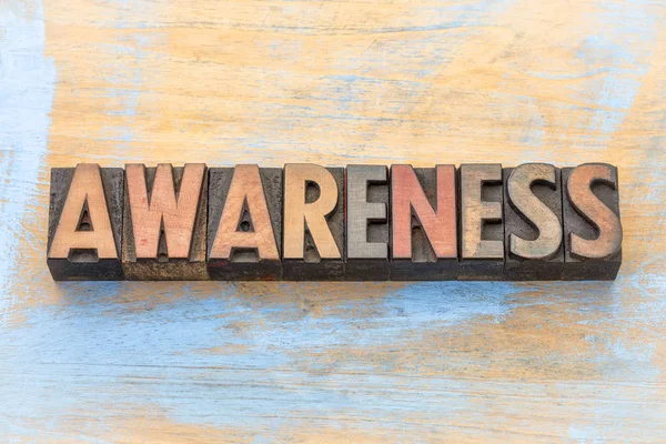 Awareness word abstract in wood type — Stock Photo, Image