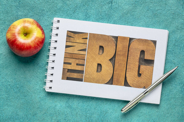 think big word abstract in wood type