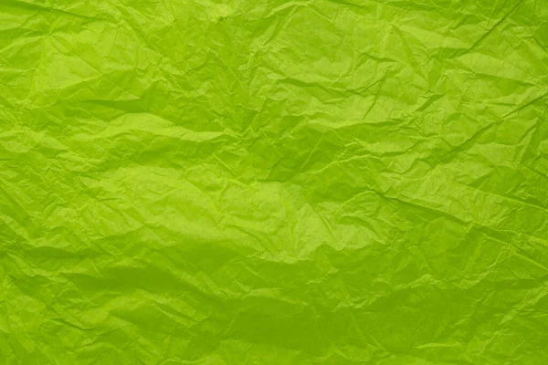 Verfrommeld en wrinled groen papier — Stockfoto