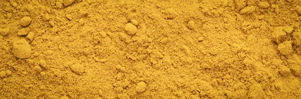 Turmeric root powder background and texture — Stock Photo, Image