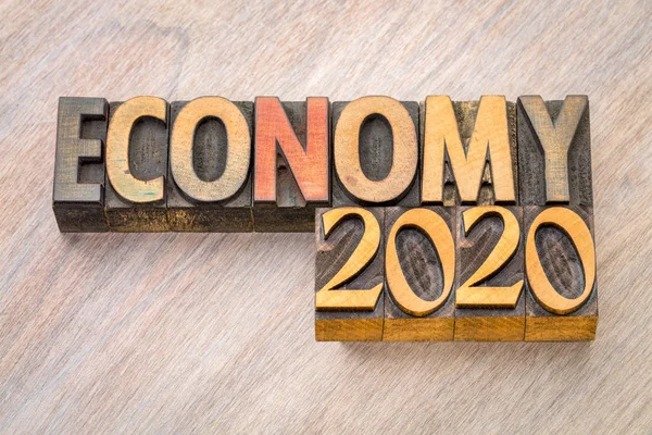 Economy 2020 word abstract in wood type — Stock Photo, Image