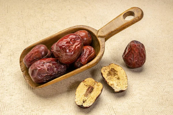 scoop of dried jujube fruits